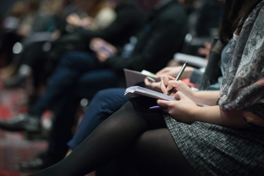 Students taking notes during class