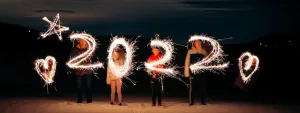 Digits of the year 2022 captured on film by children waving sparklers