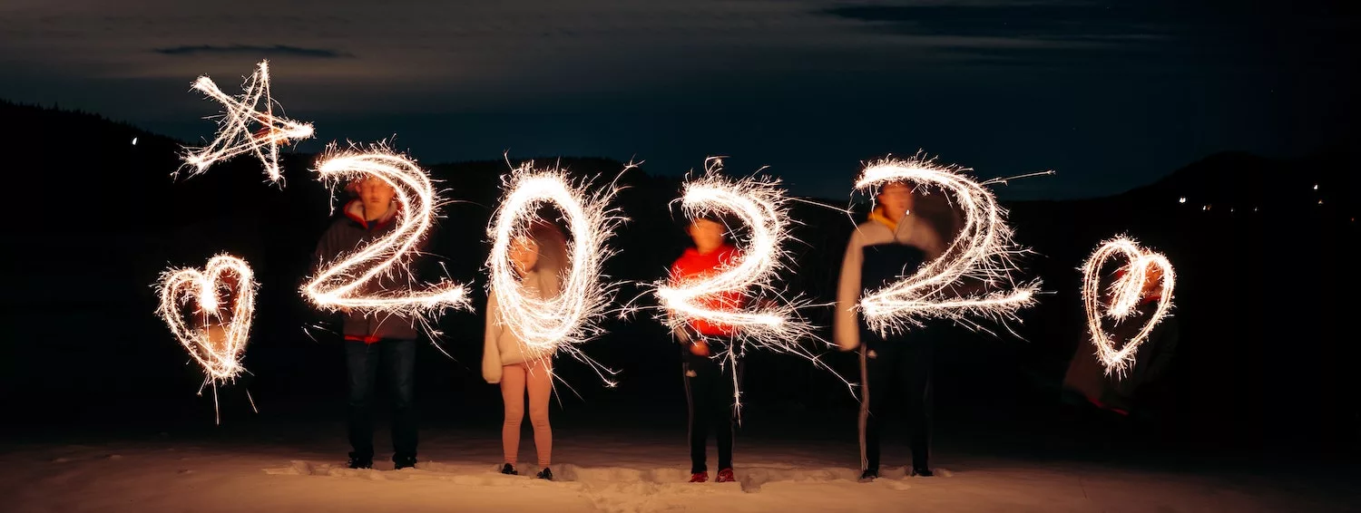 Digits of the year 2022 captured on film by children waving sparklers