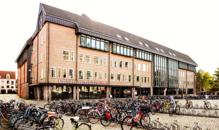 university library building with bikes parked outside