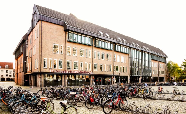 university library building with bikes parked outside