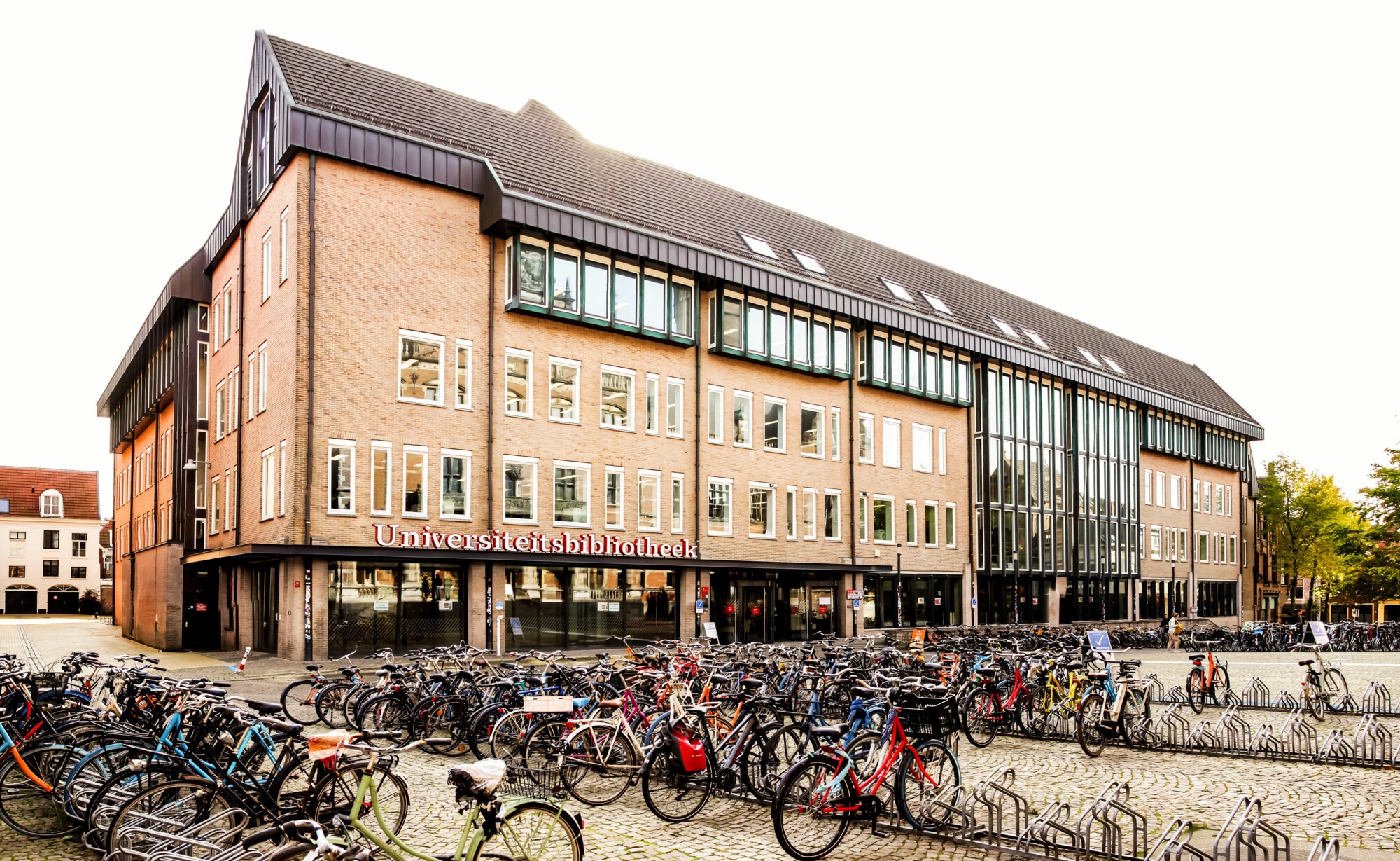 university library building with bikes parked outside
